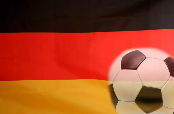 Soccer ball on a German flag — Stock Photo, Image