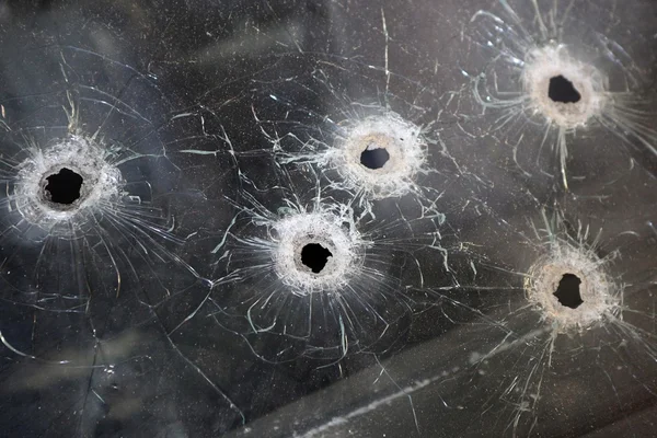 The bullet holes in the glass — Stock Photo, Image