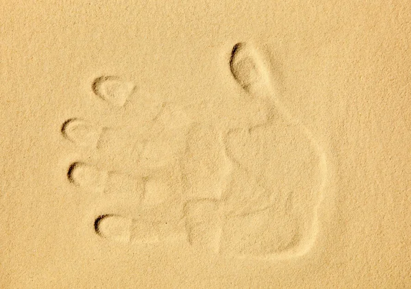 Handprint in the sand — Stock Photo, Image