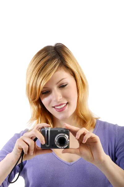 Joven hermosa mujer con una cámara — Foto de Stock