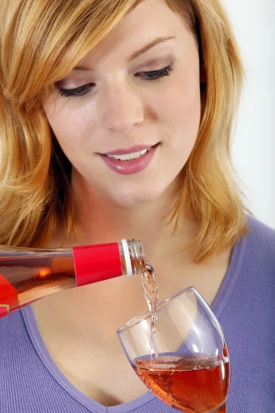 Woman with a bottle wine and a wineglass — Stock Photo, Image