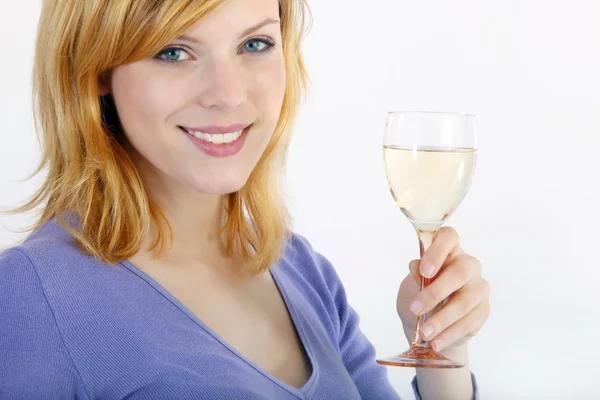 Girl drinking from a glass of wine — Stock Photo, Image