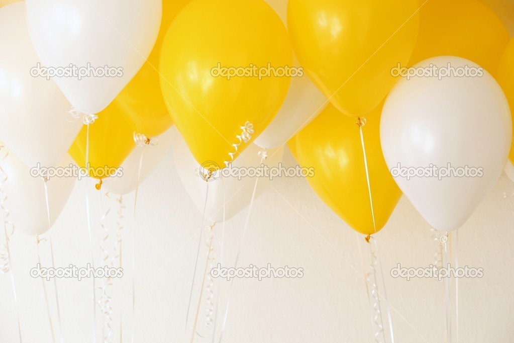 Yellow and white balloons