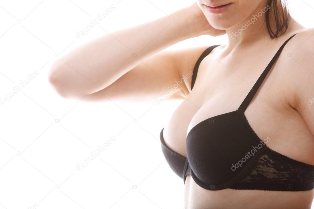 Young female body with black bra