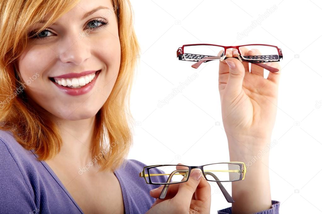 Young beautiful woman with two eyeglasses