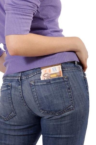 Woman with bank notes in jeans (white background) — Stock Photo, Image