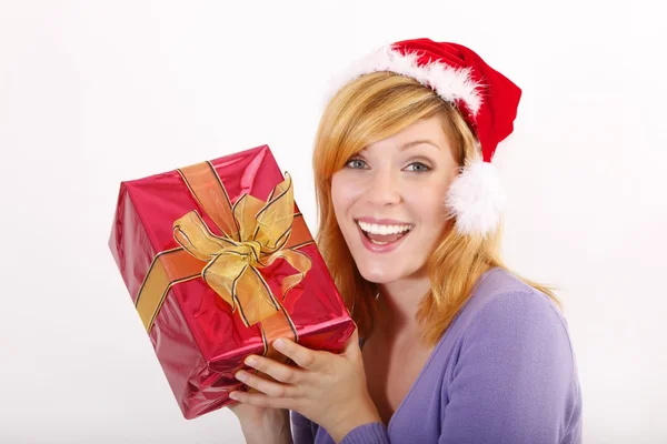 Santa girl holding gift — Stock Photo, Image