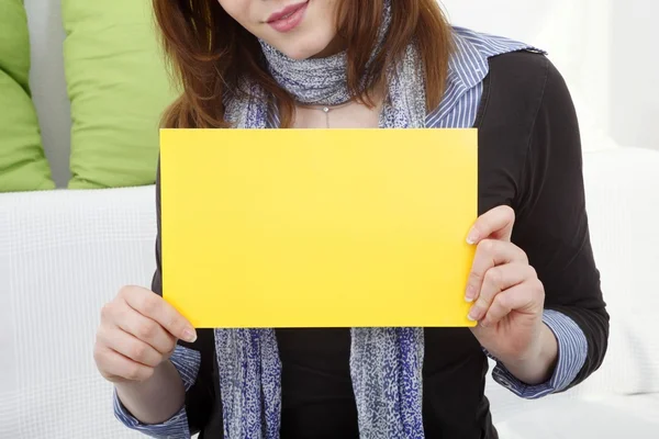 Young woman with blank panel — Stock Photo, Image