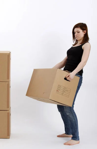 Young woman with cardboard box — Stock Photo, Image