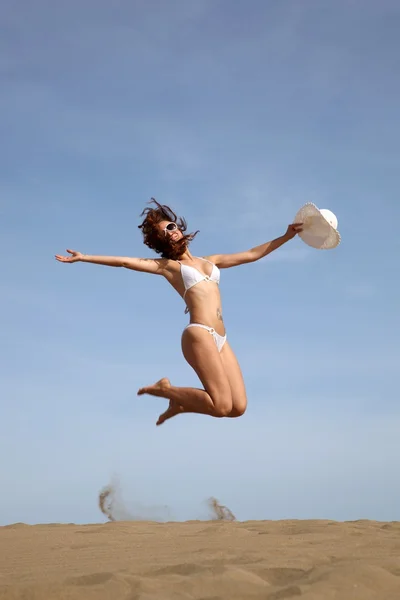 Jumping bikini beauty — Zdjęcie stockowe