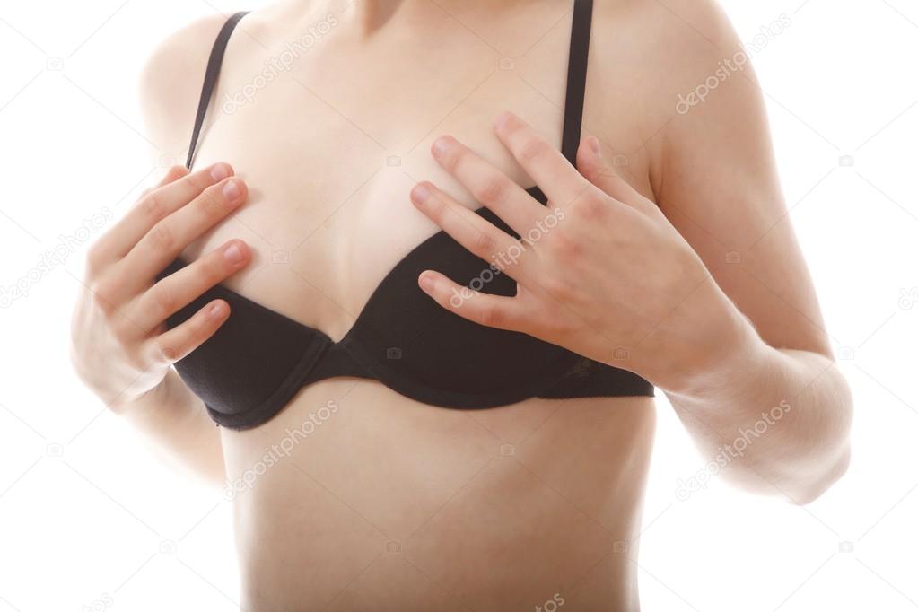 Young female body with black bra