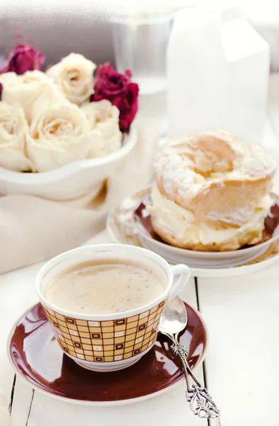 A Paris Brest, a French Dessert, and coffee — Stock Photo, Image