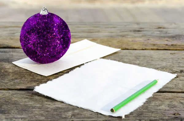 Writing letter to Santa Claus on the vintage wooden table — Stock Photo, Image