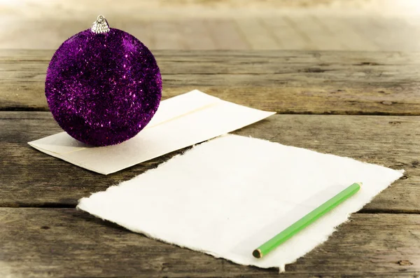 Writing letter to Santa Claus on the vintage wooden table — Stock Photo, Image