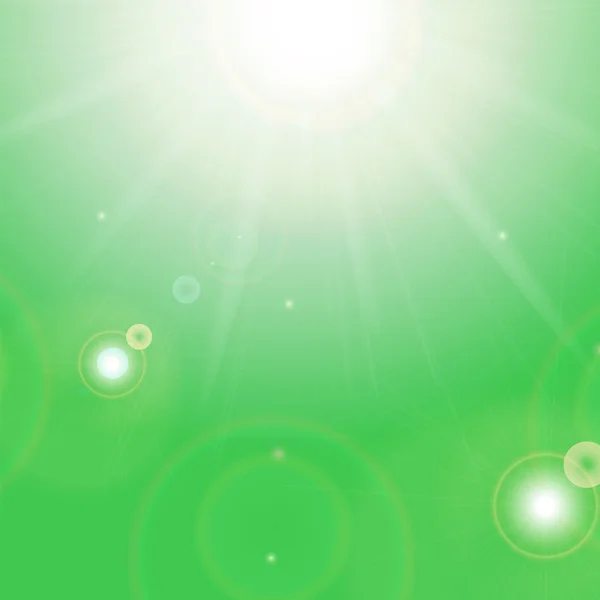 Sol y rayos de sol sobre un fondo verde — Vector de stock