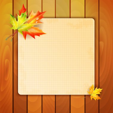 Sheet in a cage with a place for your text decorated with autumn clipart