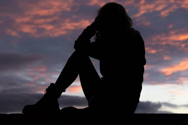 Premium Photo  Sad woman silhouette worried at sunset