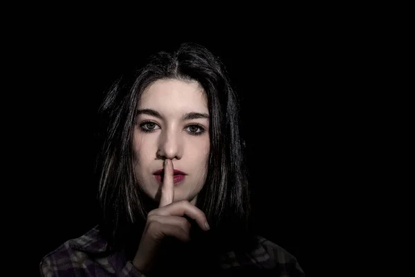 Brunette Woman Commanding Silence Black Background — Stock Photo, Image