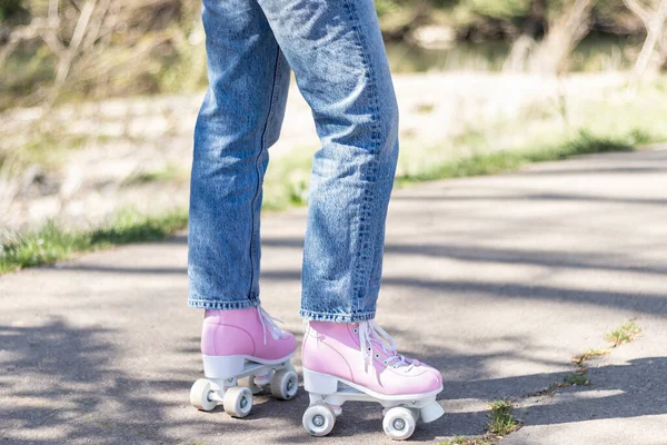 Woman Legs Jeans Pink Roller Skates Park — Stockfoto