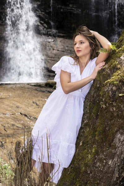 Blonde Woman White Dress Leaning Tree Waterfall — Stock Photo, Image