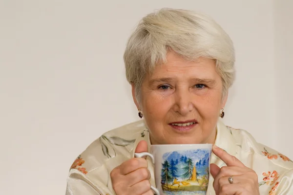 Woman drinking tea — Stock Photo, Image