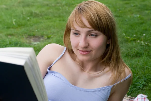 Girl with a book — Stock Photo, Image