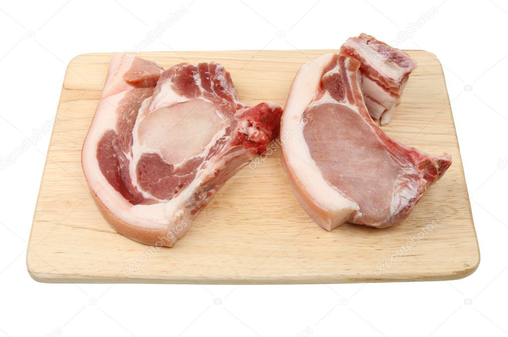 Pork chops on a board