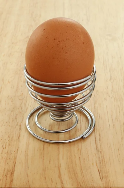 Egg on wood — Stock Photo, Image