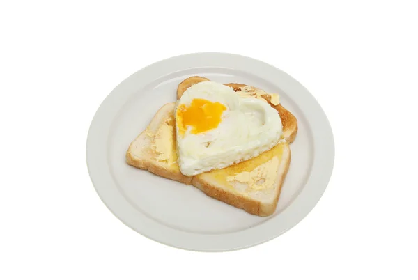 Heart shaped fried egg — Stock Photo, Image