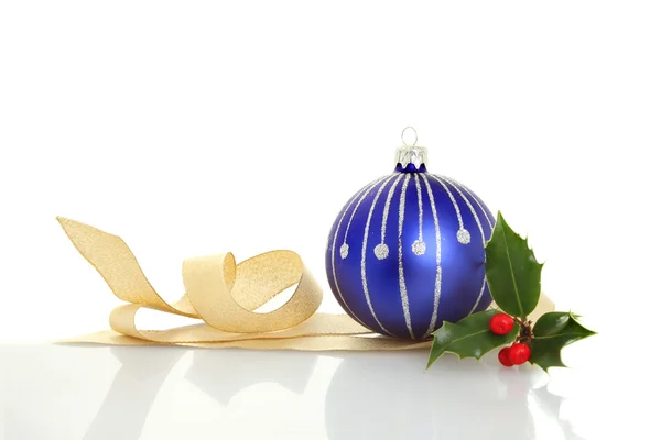 Bauble ribbon and holly — Stock Photo, Image