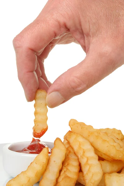 Hand and chips — Stock Photo, Image