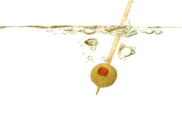 Olive on stick in water — Stock Photo, Image