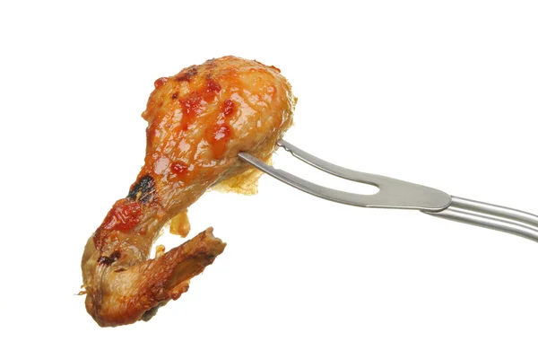 Chicken leg on fork — Stock Photo, Image
