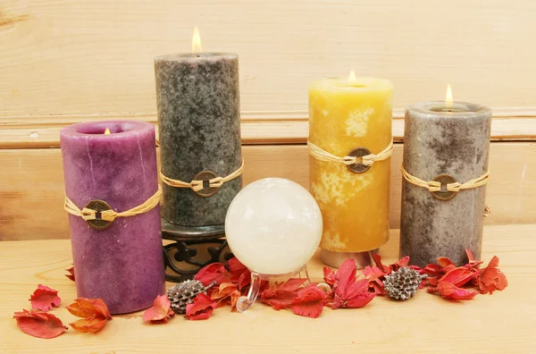 Feng Shui candles and a crystal ball — Stock Photo, Image