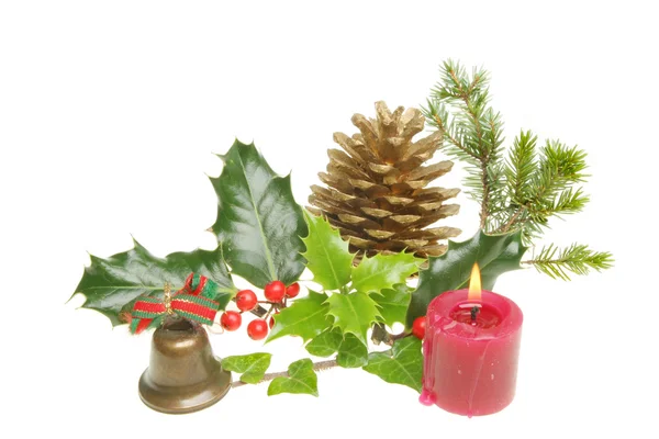 Christmas foliage candle and bell — Stockfoto