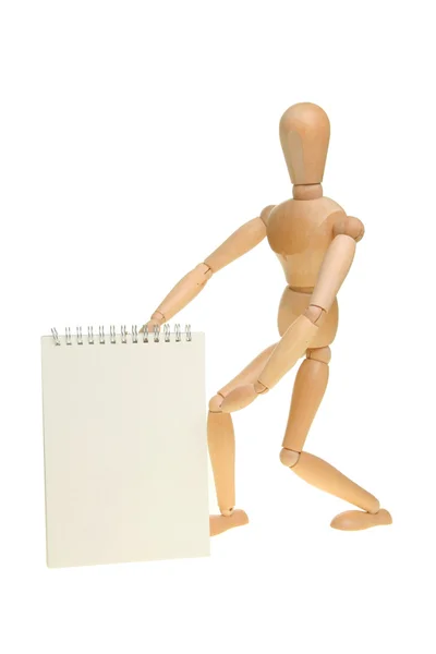 Artist's manikin holding pad Stock Picture