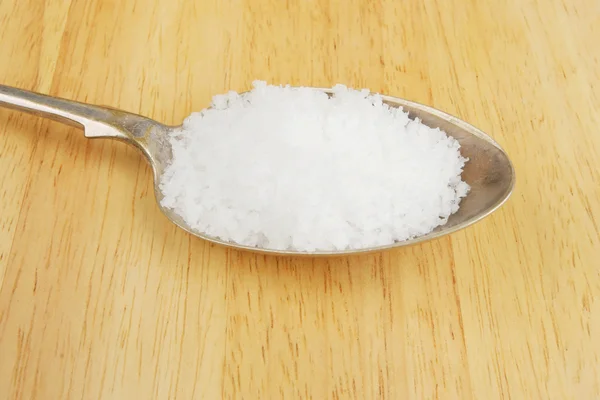 Salt in spoon — Stock Photo, Image