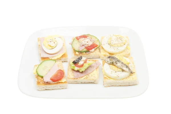 Selection of canapes on a plate — Stock Photo, Image