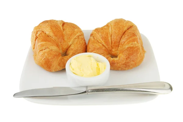 Croissants butter and knife — Stock Photo, Image