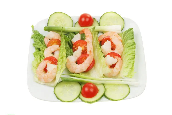 Prawn salad on a white plate — Stock Photo, Image