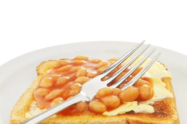 Baked beans with a fork — Stock Photo, Image