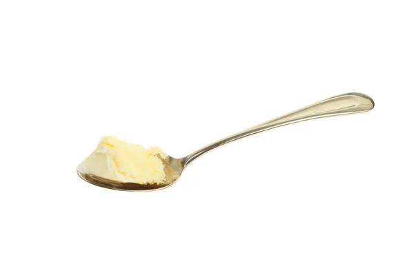 Cream in teaspoon — Stock Photo, Image