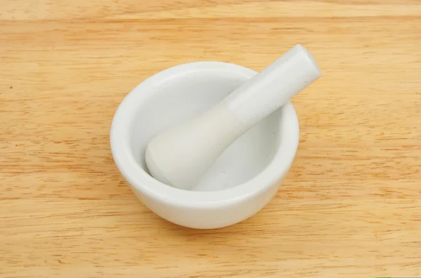 Pestle and mortar on wood — Stock Photo, Image