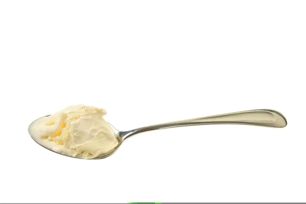 Cream in dessert spoon — Stock Photo, Image