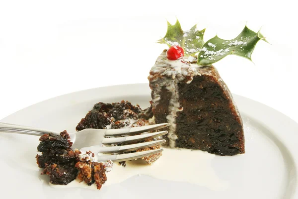 Christmas pudding with cream — Stock Photo, Image