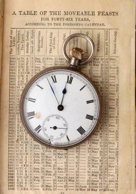 Antique watch on calendar clipart