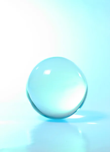 Bola de cristal luz turquesa — Fotografia de Stock
