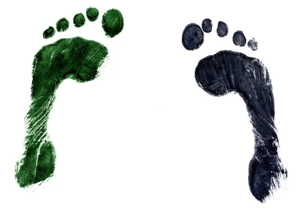 Green left foot & black right foot — Stock Photo, Image