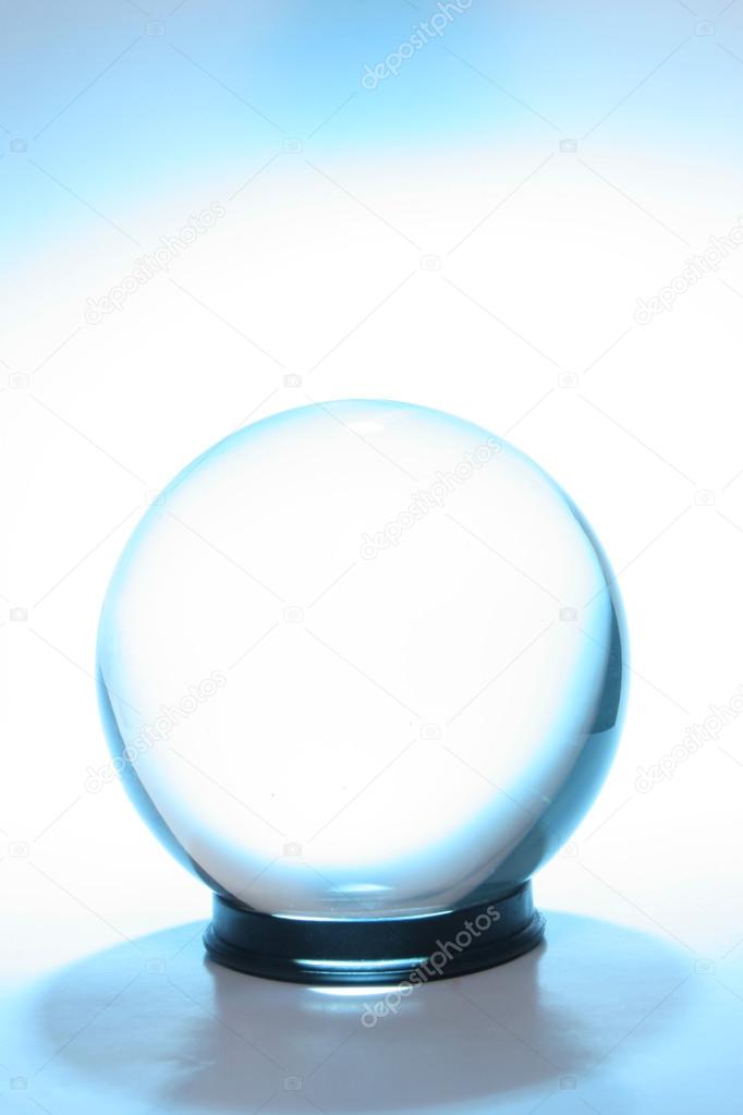 Crystal ball surrounded by blue light