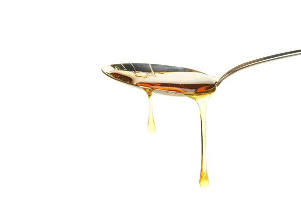 Syrup in spoon — Stock Photo, Image